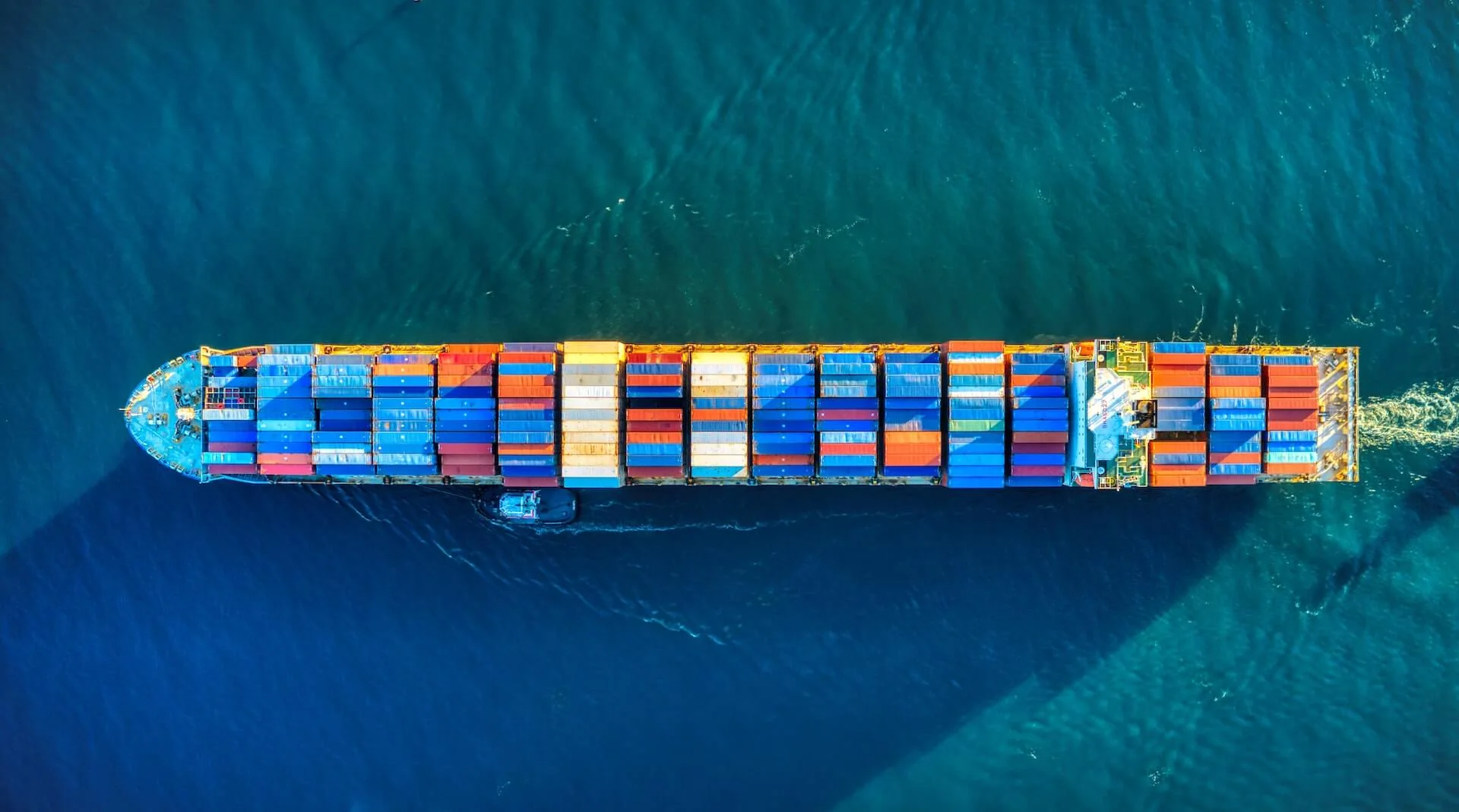 Container vessel at sea representing international trade and logistics strategy